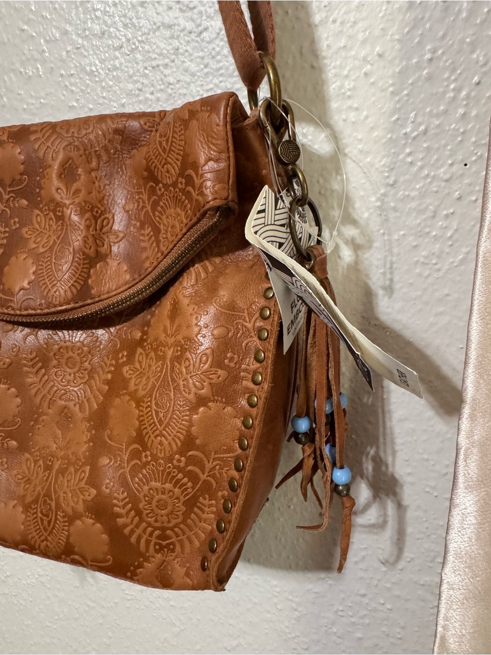 The Sak Brown Floral-Embossed Crossbody Bag with Tassel - Picture 7 of 15
